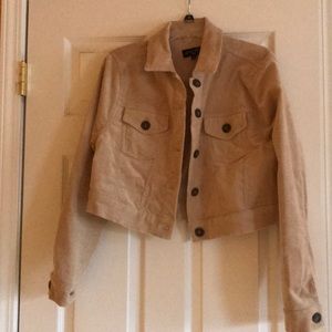 Cropped corduroy and tan jacket.